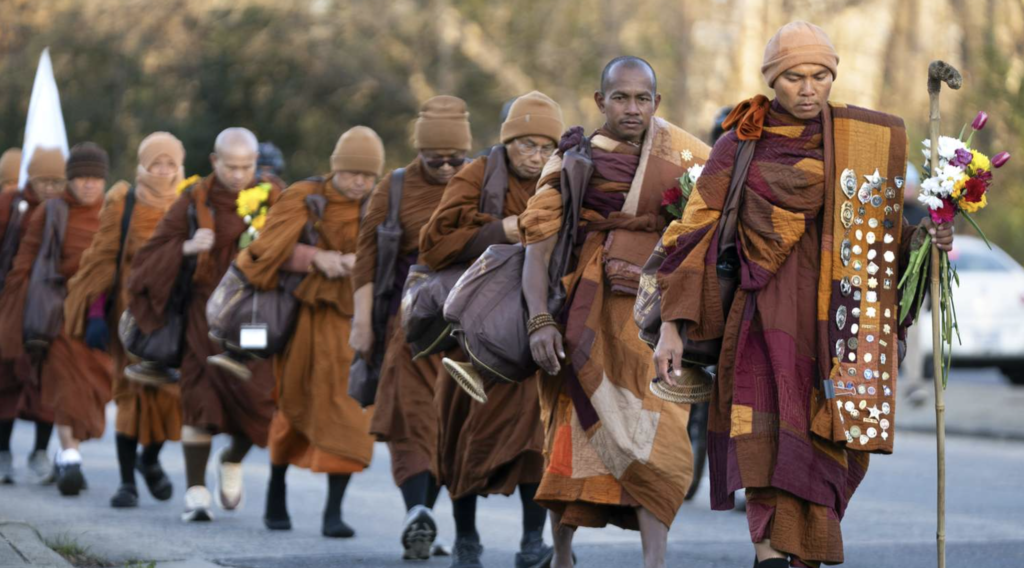 Buddhist monks place bracelet on autistic boy in North Carolina viral kindness video